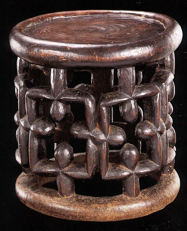 Tabouret soutenu par des motifs abstraits