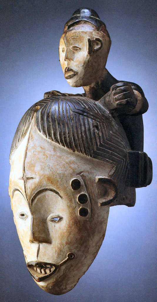 Masque facial igbo surmonté d’un enfant